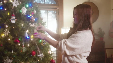 Christmas Tree Decorating 6K 48FPS SLO-MO Video stock 144465825