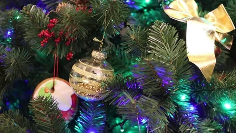 Christmas tree with decorations and lights close-up for background Stock Footage 120609173