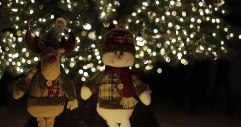 Christmas tree with decorations and warm lights. Creating a festive atmosphere. Stock Footage 295287196