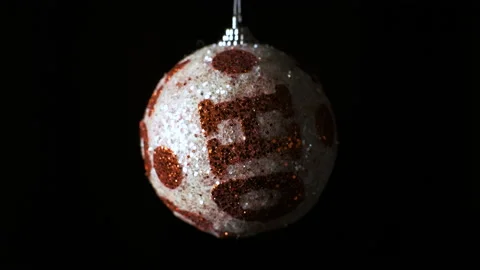 Christmas tree decorations on a black background. Festive Christmas balls  Stock Footage 144468954