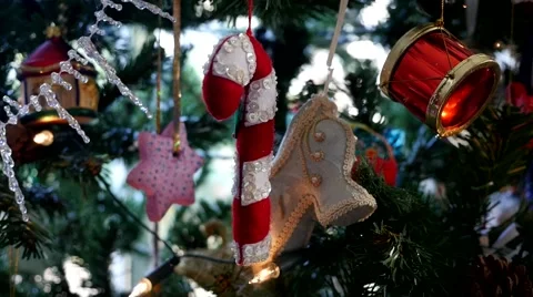 Christmas tree decorations, candy cane, drum and star Stock Footage 66689536