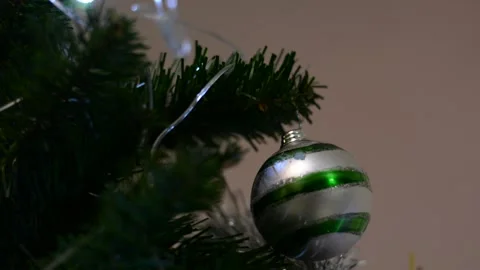 Christmas tree decorations close-up with variable focus under low lighting.  Chr Stock-Footage 145659809