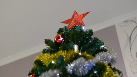 Christmas tree decorations close-up with variable focus under low lighting.  Chr Stock Footage 145659819