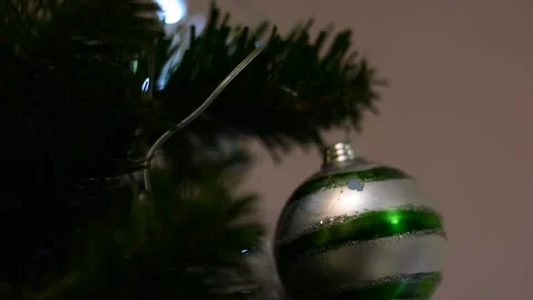 Christmas tree decorations close-up with variable focus under low lighting.  Chr Stock Footage 145659839