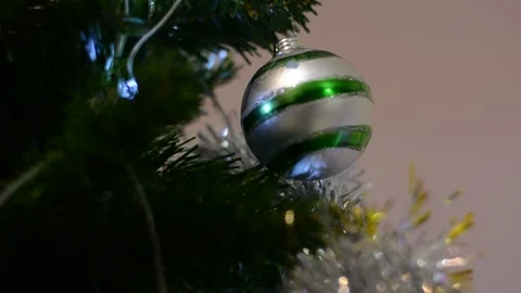 Christmas tree decorations close-up with variable focus under low lighting.  Chr Stock Footage 145659854