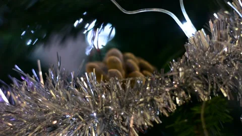 Christmas tree decorations close-up with variable focus under low lighting.  Chr Stock Footage 145659874