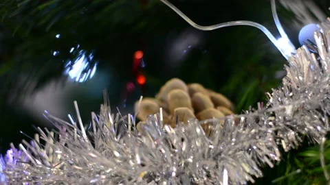 Christmas tree decorations close-up with variable focus under low lighting.  Chr Stock Footage 145659877