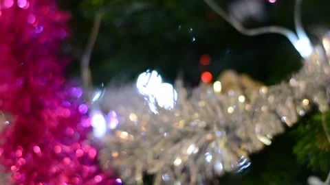 Christmas tree decorations close-up with variable focus under low lighting.  Chr Stock Footage 145659884
