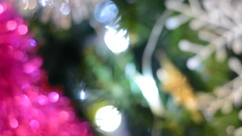 Christmas tree decorations close-up with variable focus under low lighting.  Chr Stock Footage 145659930