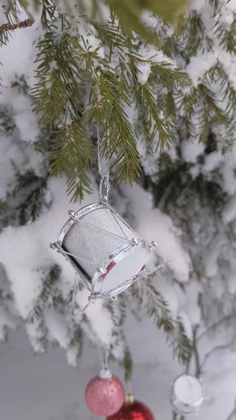 Christmas tree decorations in the forest. Drums, balls, snow Stock Footage 165777550