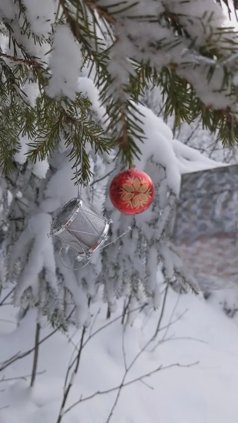 Christmas tree decorations in the forest. Gift box, drum, ball Stock Footage 165777549