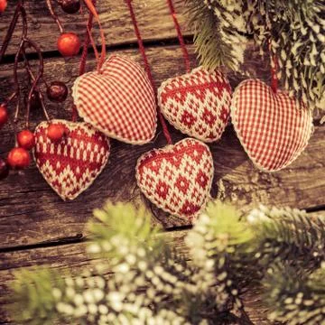 Christmas tree decorations hanging on branch Stock Photos