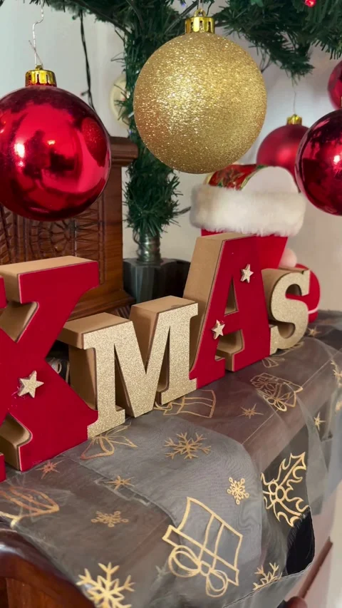 Christmas tree decorations with red baubles and xmas sign Video stock 334592663