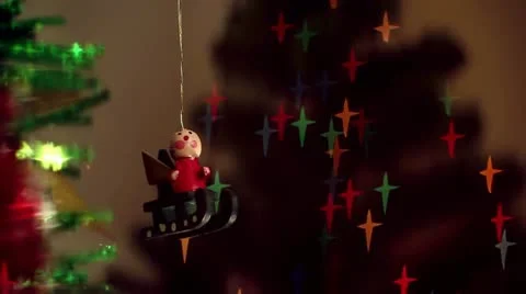 Christmas-tree decorations on starshaped background Stock Footage 12500120