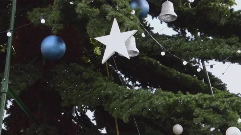 Christmas tree decorations sway in the wind. Stock Footage 147114575