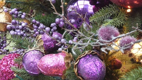 Christmas tree decorations. Violet balls on a branch. Stock Footage 82522146