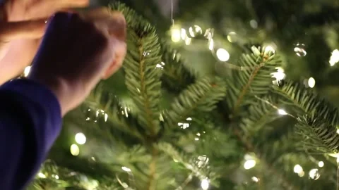 Christmas Tree Decorations.White LED String Lights.cozy festive atmosphere Stock Footage 334950080