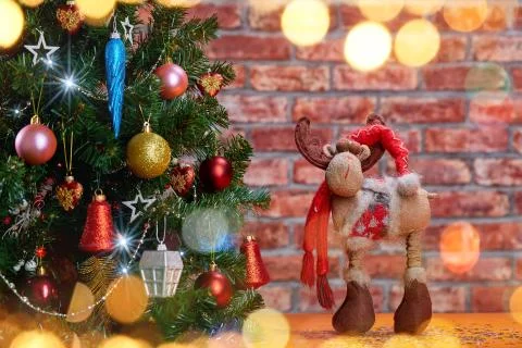 Christmas tree with deer on the table Stock Photos
