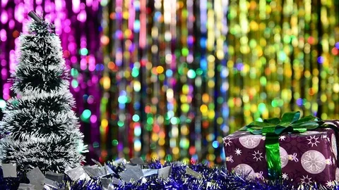 Christmas tree falling confetti and gift box Stock Footage 121445295