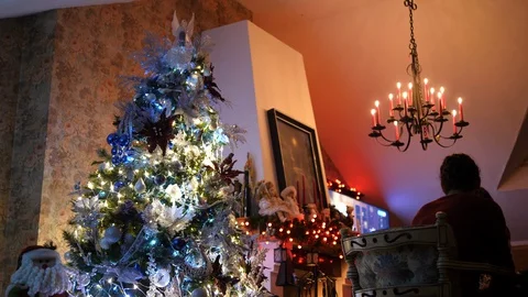 Christmas Tree fireplace decorations with red blue lights in Attic. Family house Stock Footage 129822050