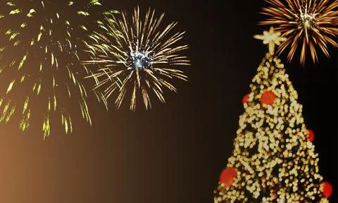 Christmas tree on a fireworks background Stock Photos