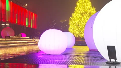 Christmas tree glows with moonGarden Installation at South Street Seaport in NYC Stock-Footage 297315959