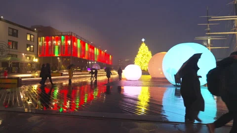 Christmas tree glows with moonGarden Installation at South Street Seaport in NYC Vídeo Stock 297453489