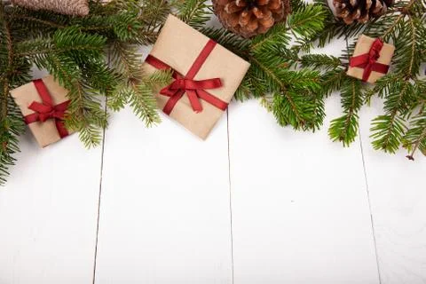 Christmas tree with handmade gifts on white wooden background. Flat lay, top  Stock Photos