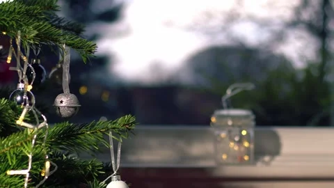Christmas tree in home in front of window Stock Footage 260928210