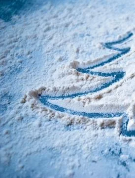 Christmas tree image on a blue surface Stock Photos
