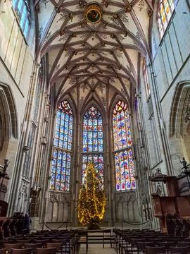 Christmas tree inside the Cathedral of Bern in Switzerland Stock Photos