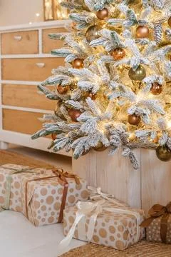 Christmas tree in the interior of the bedroom decorated for the New Year Stock Photos