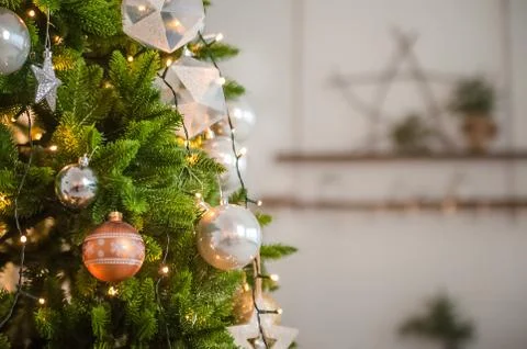  Christmas tree in the interior in defocus. Background for a Christmas card in l Stock Photos