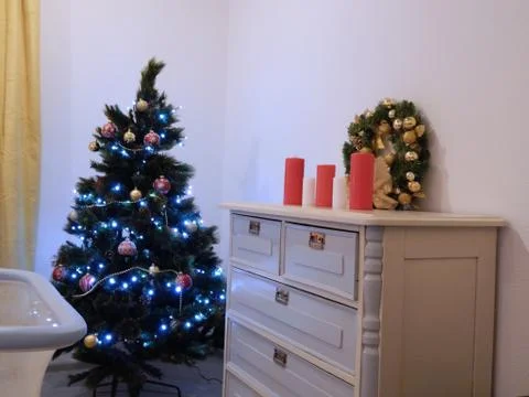 Christmas tree in the interior of the house Stock Photos