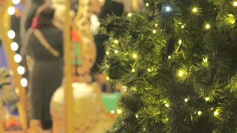 Christmas Tree with Lights and Carousel on a Rainy Holiday Evening in Paris Video stock 303781364