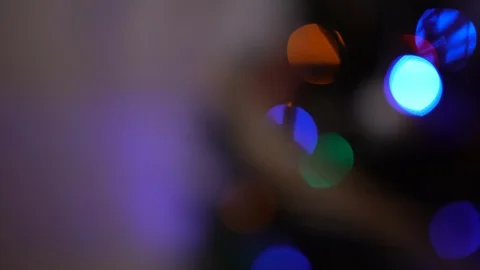 Christmas tree lights blinking at night, christmas decoration. Abstract lights Stock Footage 119791680