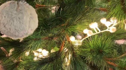 Christmas tree with lights, fur and glass ornaments, xmas concept Stock Footage 167137635