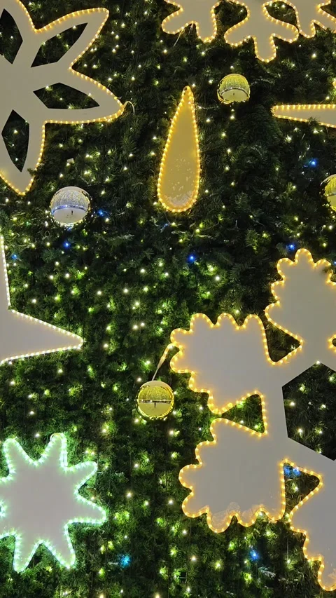 Christmas tree lights glittering at night. New Year fir tree with decorations. Stock-Footage 294023132