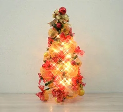 Christmas tree lit Stock Photos
