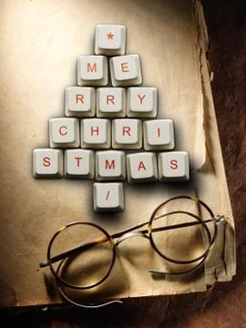 Christmas tree made of computer keys and glasses, Old paper background 스톡 사진