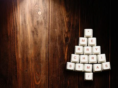 Christmas tree made of computer keys,tree background with vignette Foto stock