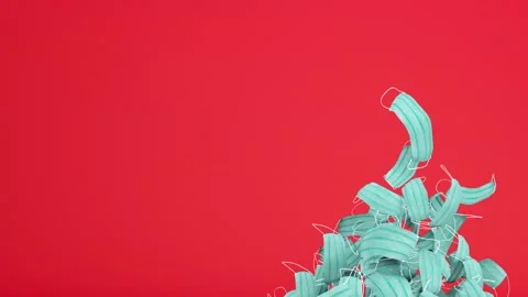 Christmas tree made of protective masks with red background Copy space Stock Footage 144733726