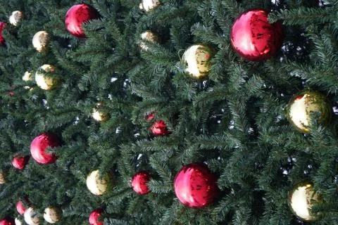 Christmas tree with multi-colored balls and decorations background Stock Photos