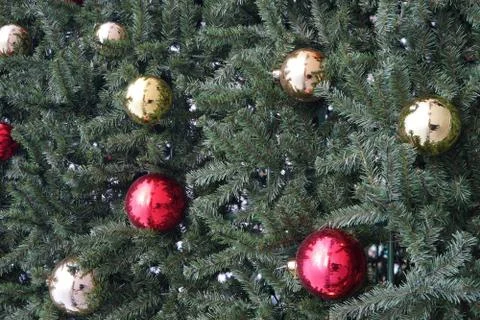 Christmas tree with multi-colored balls and decorations background Stock Photos