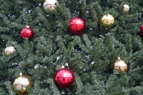 Christmas tree with multi-colored balls and decorations background Stock Photos