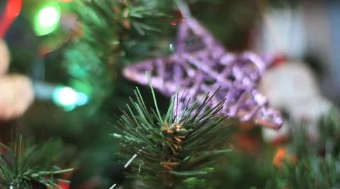 Christmas tree ornament - Purple star rack focus on snowman Stock Footage 59130135