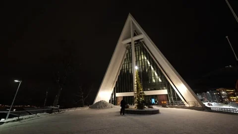 Christmas Tree outside the Arctic Cathedral in Tromso, Norway at night Stock Footage 301553443