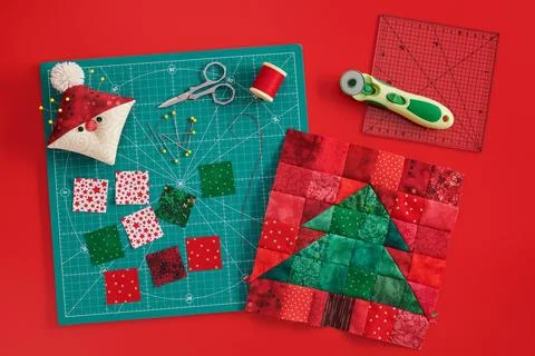 Christmas tree patchwork block, craft mat, bright square pieces of fabric, .. Stock Photos