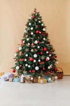Christmas tree pine decor beige background New Year holiday gifts 스톡 사진