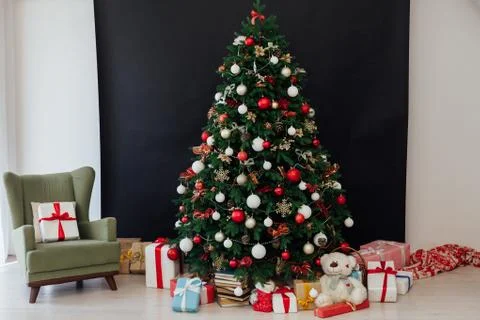 Christmas tree pine decor black background New Year holiday gifts Stock Photos